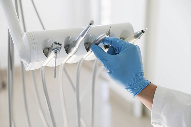 Professional Invisalign Clear Aligners technician working in Corrales, NM